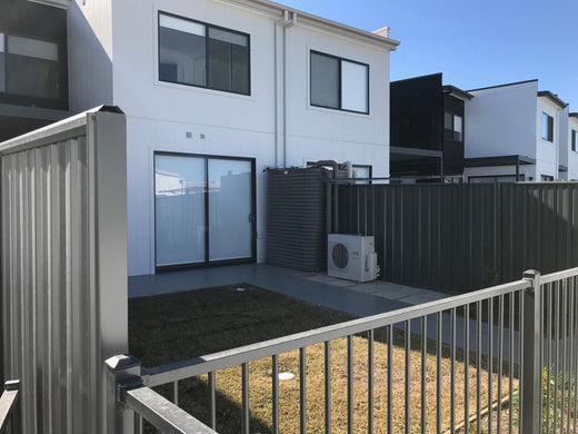 A steel water tank installed in a central coast home by coast and country water tanks