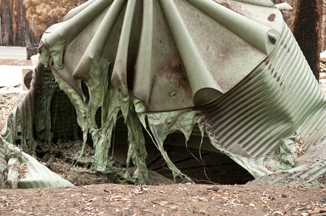 melted poly water tank bush fire